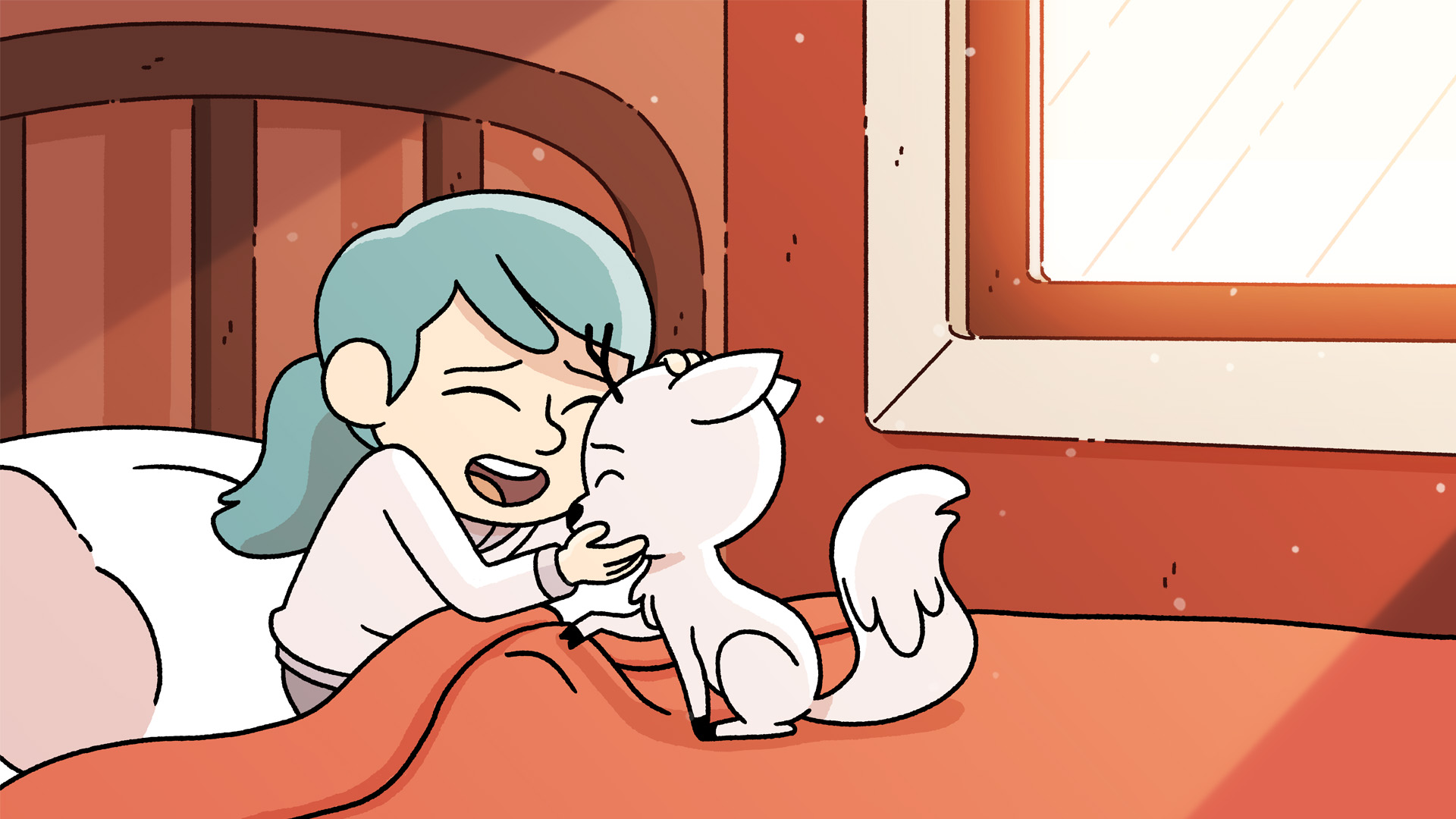 Hilda and Twig cuddle face to face as they sit on Hilda’s bed with a red blanket. The sun beams in from a window beside them.