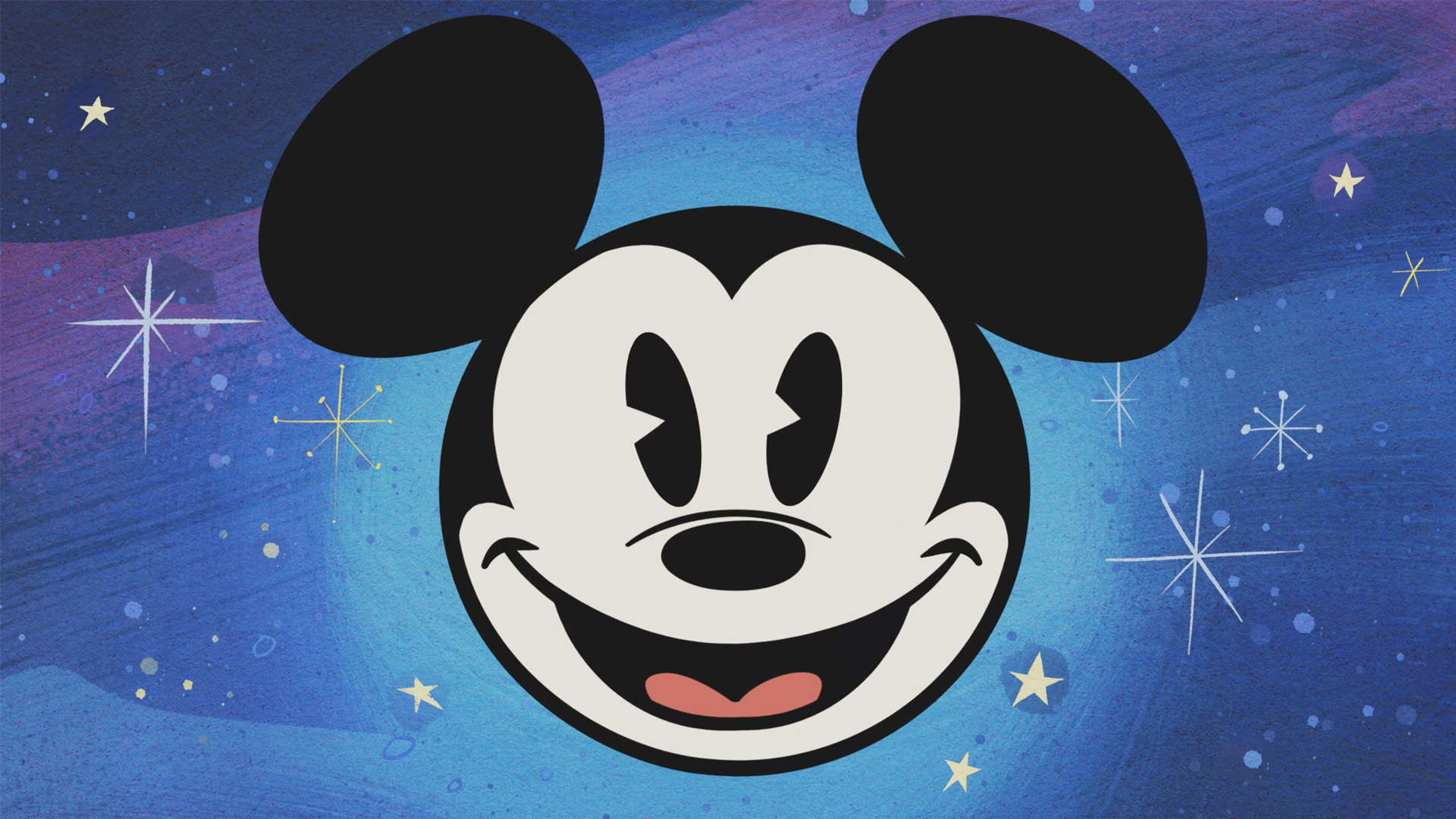 Mickey’s smiling face from The Wonderful World of Mickey Mouse is shown over top a blue background with stars.
