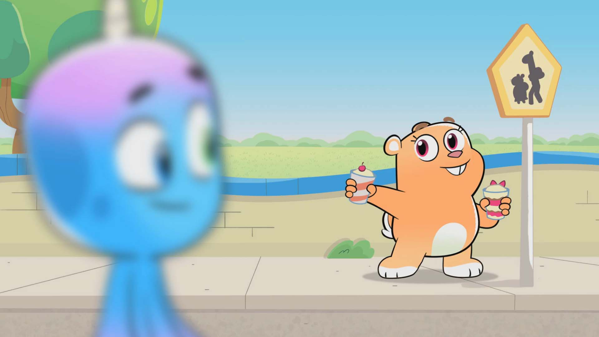 Octi from Octicorn looking behind him at his friend as they hand him a milkshake with a cherry on top.