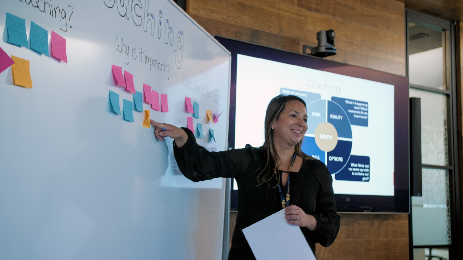 Talent Partner from Mercury Filmworks giving a presentation as she points to a whiteboard.